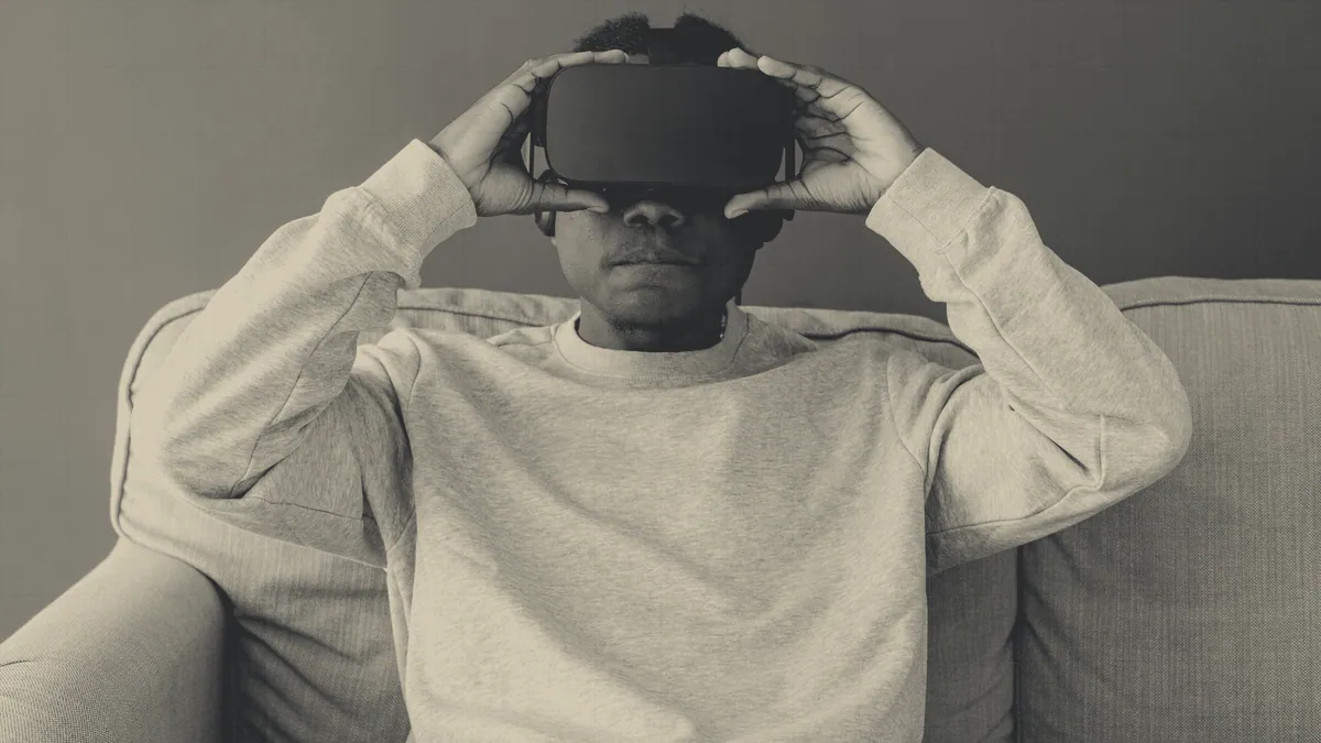 A flyer wearing video goggles.