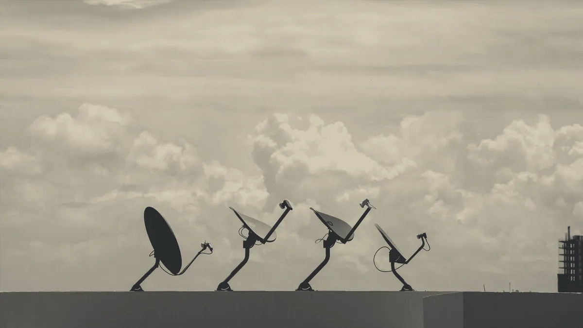 A satellite antenna aimed at the sky.